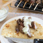 pork souvlaki in pita bread with tzatziki sauce