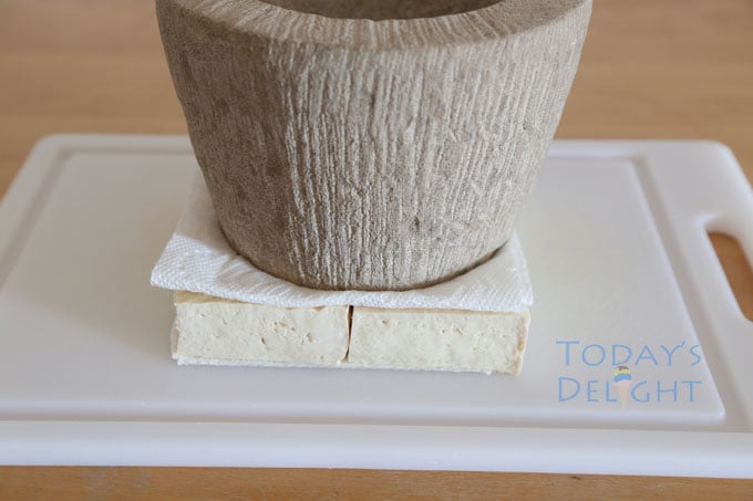 weigh tofu with something heavy