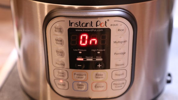 Image of instant pot showing it's on.