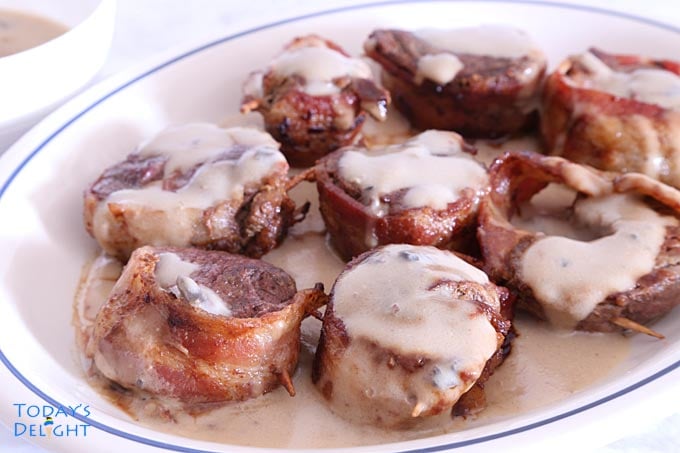 Ribeye steak wrapped in bacon.