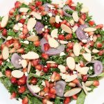 Light and Healthy Pomegranate Kale Salad in bowl.