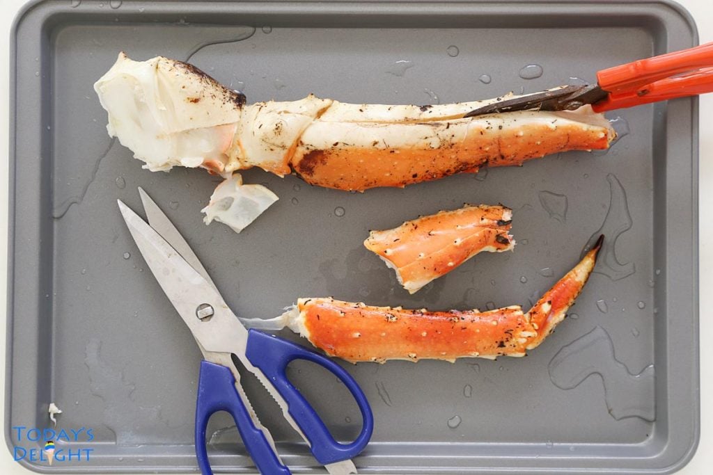 Crab leg shell cut with kitchen shears.