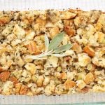 Turkey dressing with sage leaves garnish in a 9x13 casserole pan.