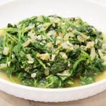 Cooked spinach in a dish.
